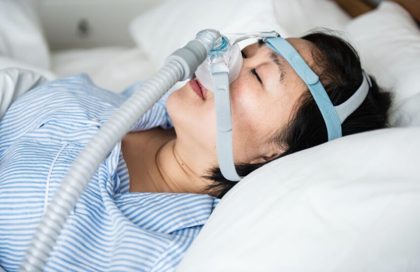 woman-wearing-anti-snoring-chin-straps